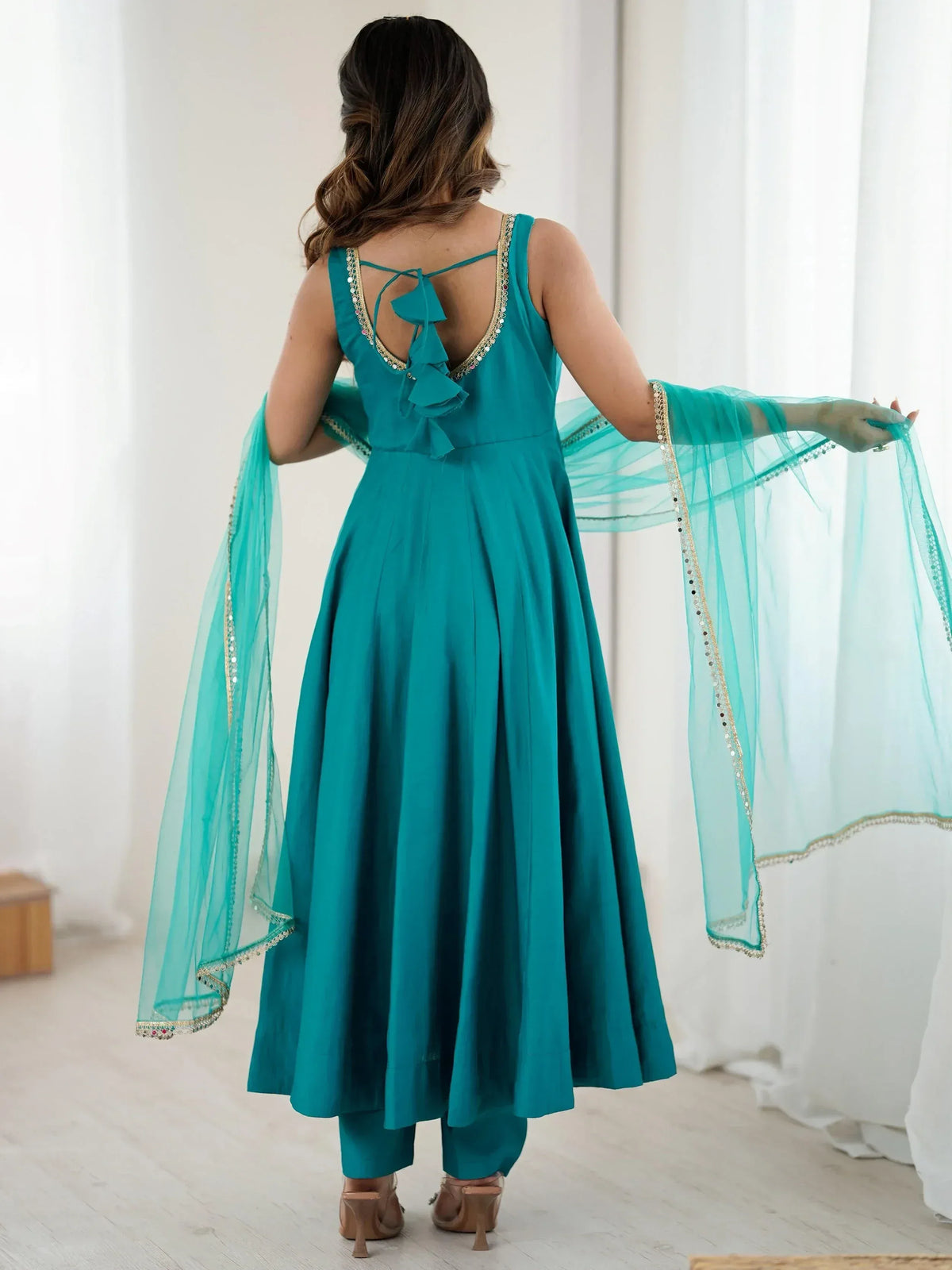 Teal ethnic anarkali gown with sheer dupatta, back view, ruffle detail, gold embroidery, Indian party wear