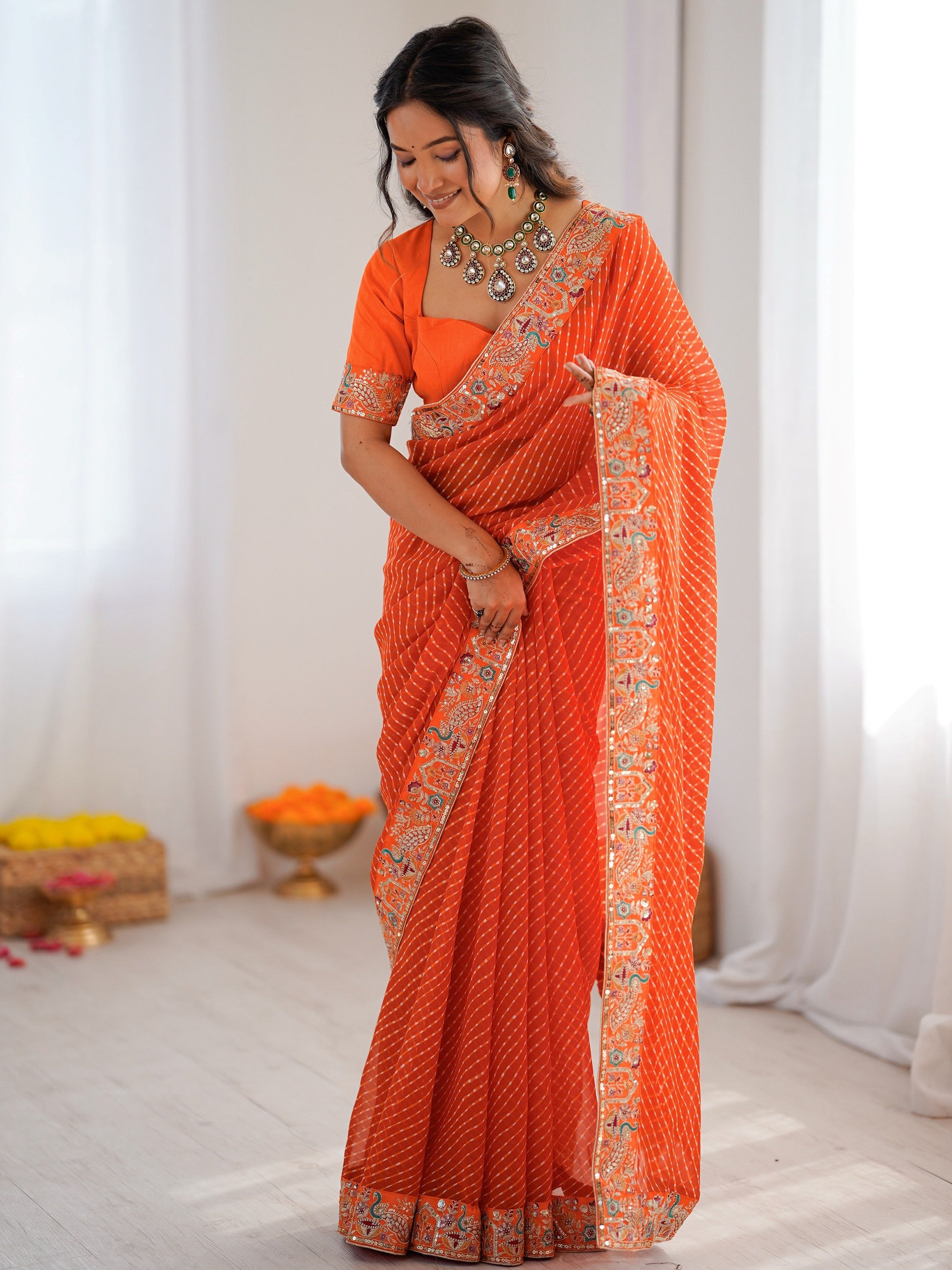 Beautiful Orange Laheriya Printed Georgette Festive Wear Saree With Blouse