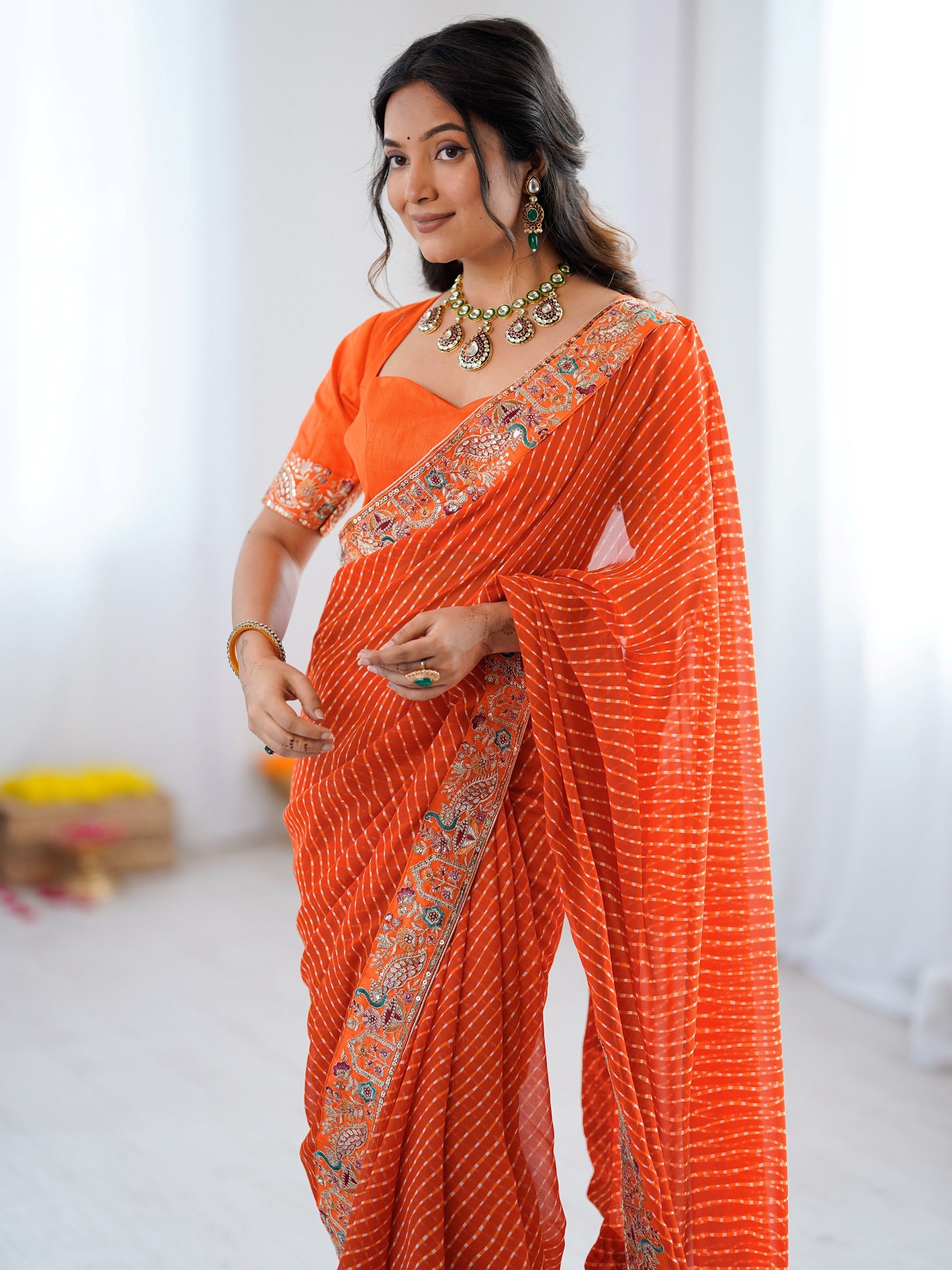 Beautiful Orange Laheriya Printed Georgette Festive Wear Saree With Blouse