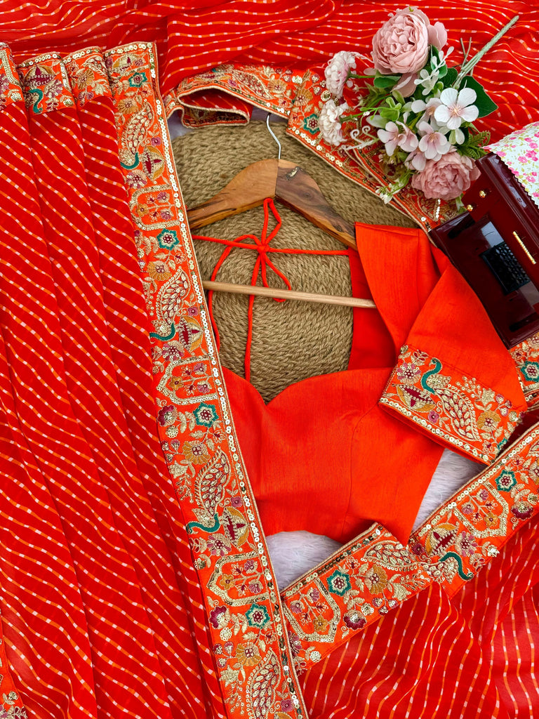 Beautiful Orange Laheriya Printed Georgette Festive Wear Saree With Blouse