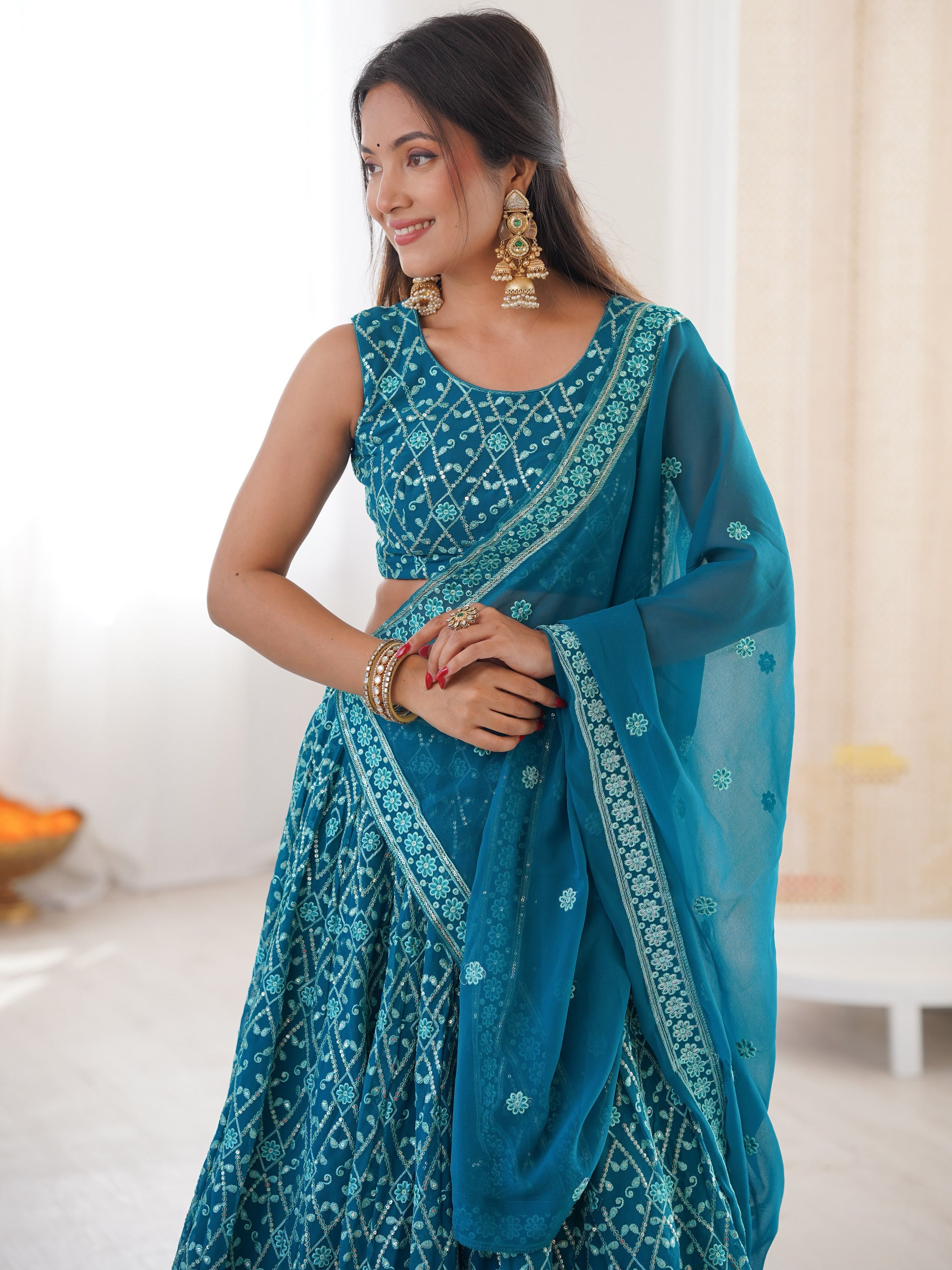 Dazzling Teal Blue Thread Work Georgette Function Wear Lehenga Choli