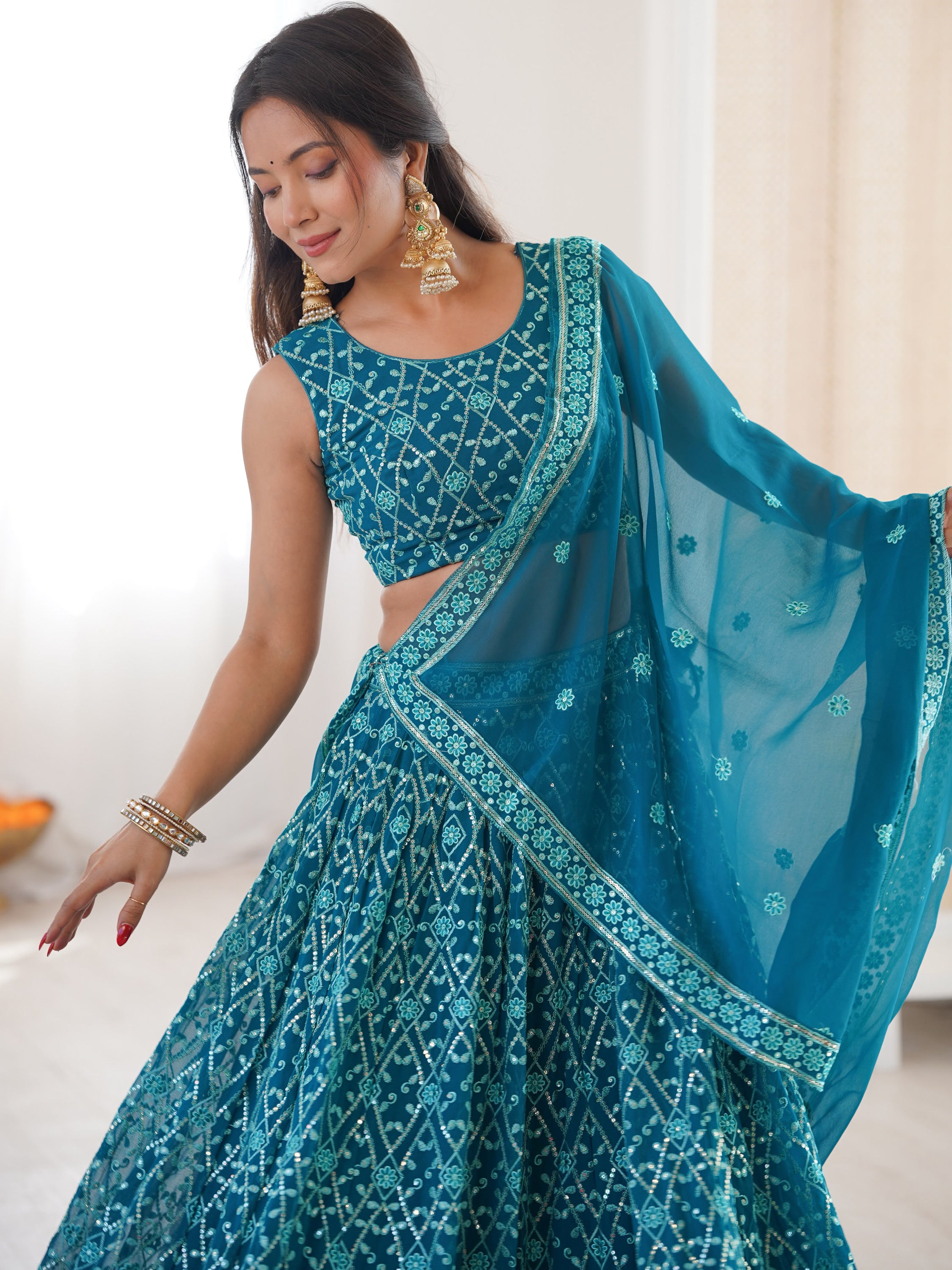 Dazzling Teal Blue Thread Work Georgette Function Wear Lehenga Choli
