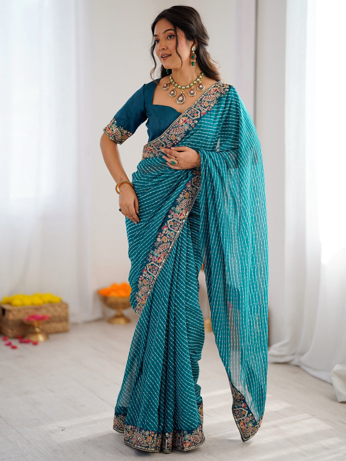 Chic Teal Blue Embroidery Bordered Georgette Event Wear Saree With Blouse