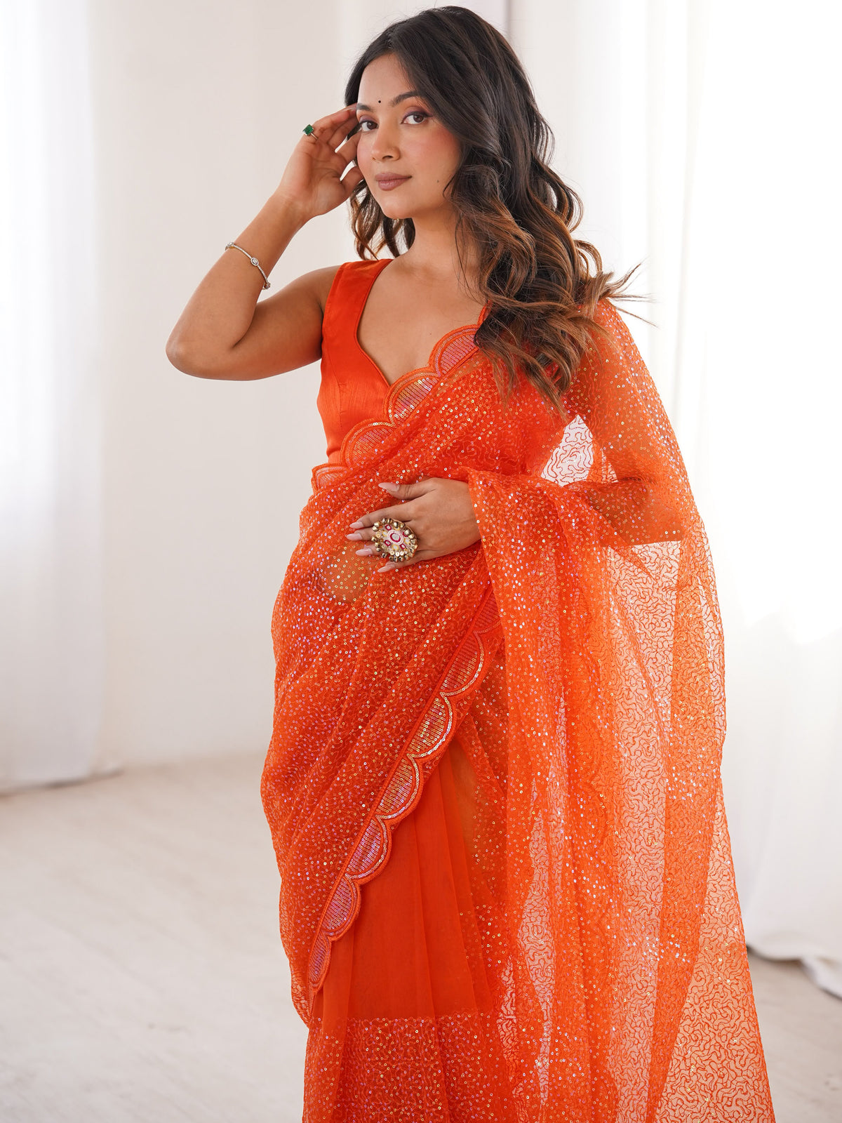 Captivating Orange Sequins Net Traditional Saree With Blouse