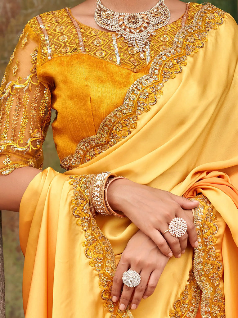 Dazzling Alphanso Yellow Sequined Satin Festive Wear Saree With Blouse