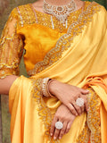 Dazzling Alphanso Yellow Sequined Satin Festive Wear Saree With Blouse