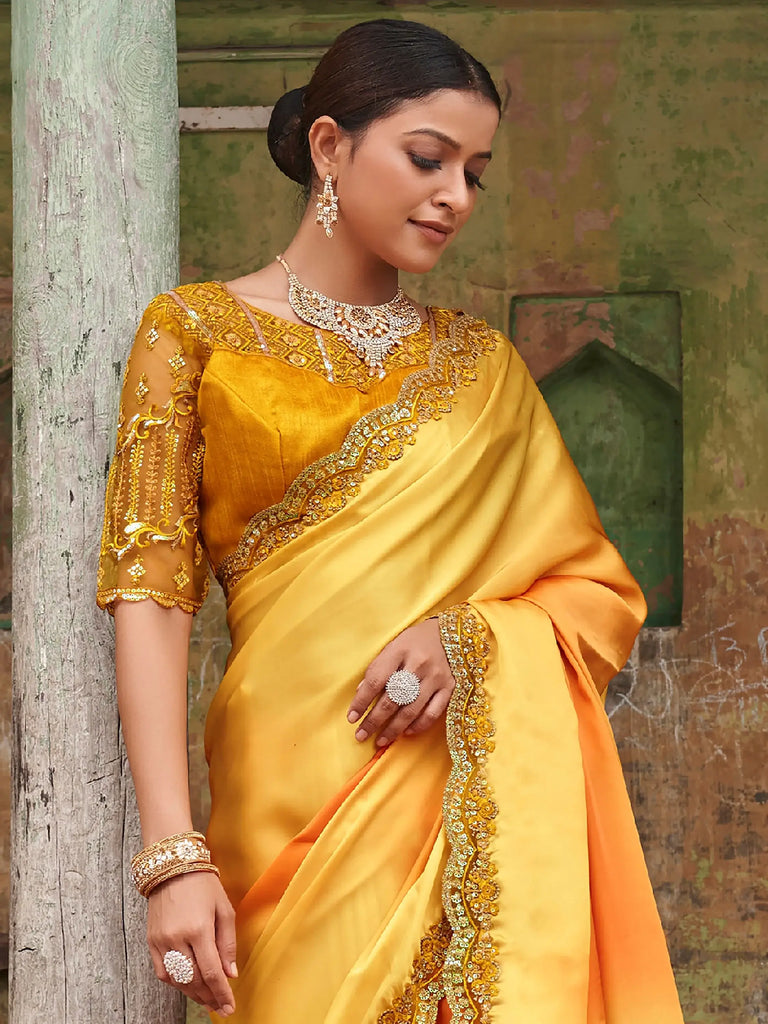 Dazzling Alphanso Yellow Sequined Satin Festive Wear Saree With Blouse