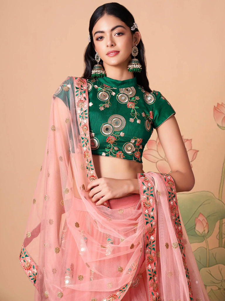 Elegant Peach Mirror Work Net Party Wear Lehenga Choli