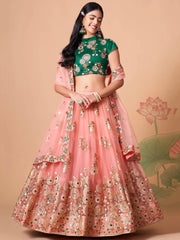 Elegant Peach Mirror Work Net Party Wear Lehenga Choli