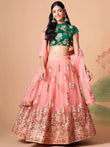 Elegant Peach Mirror Work Net Party Wear Lehenga Choli