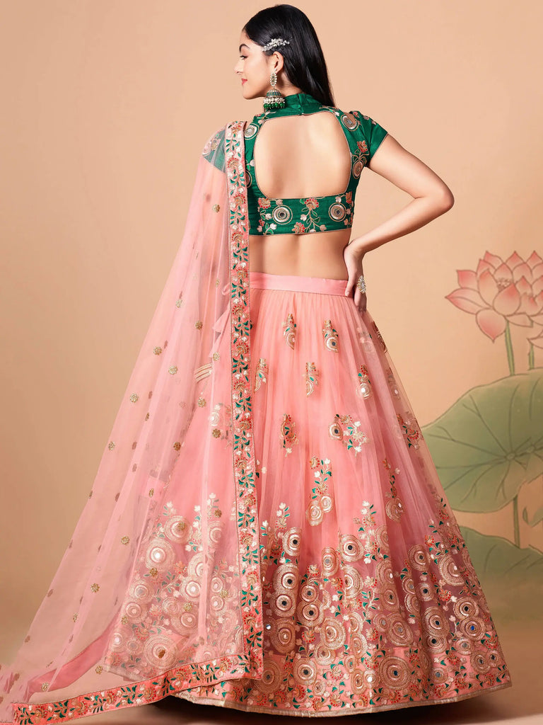 Elegant Peach Mirror Work Net Party Wear Lehenga Choli