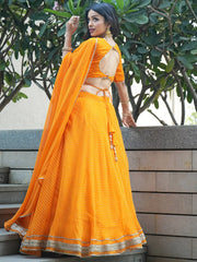 Amazing Orange Laheriya Print Georgette Haldi Wear Lehenga Choli