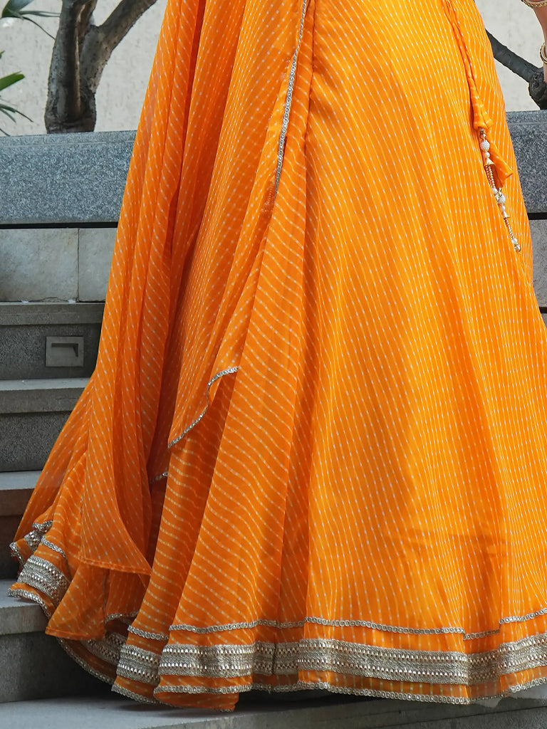 Amazing Orange Laheriya Print Georgette Haldi Wear Lehenga Choli