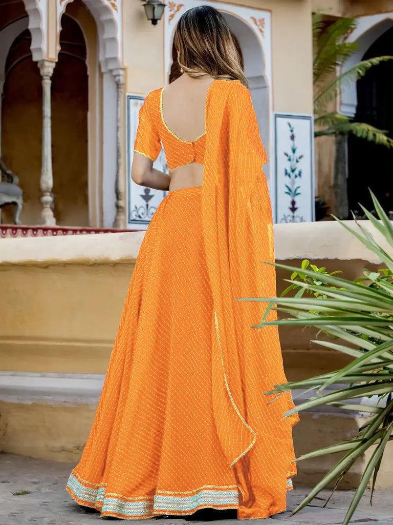 Pretty Orange Laheriya Print Georgette Wedding Lehenga Choli
