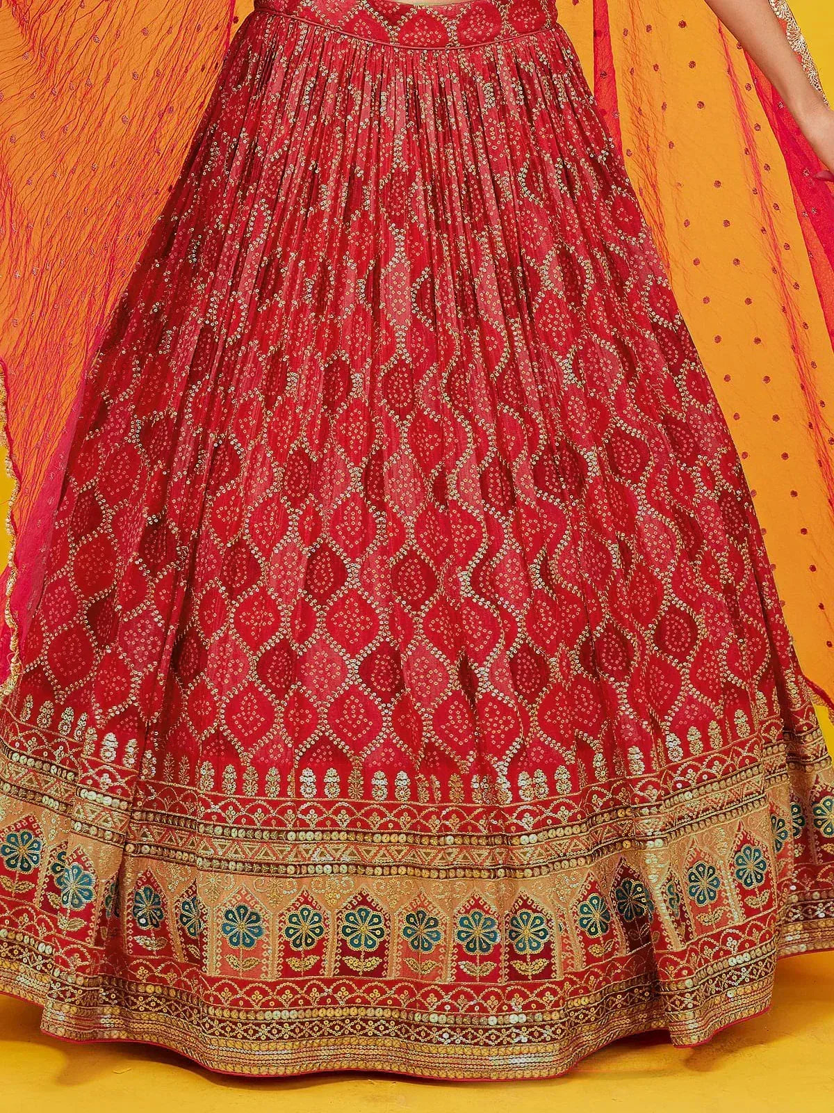 Red embroidered lehenga choli with gold and blue floral border, Indian ethnic wear