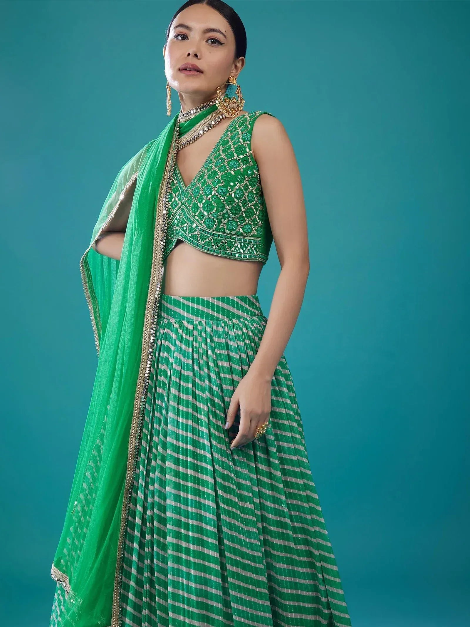 Green embroidered lehenga choli with striped skirt and dupatta, Indian ethnic wear