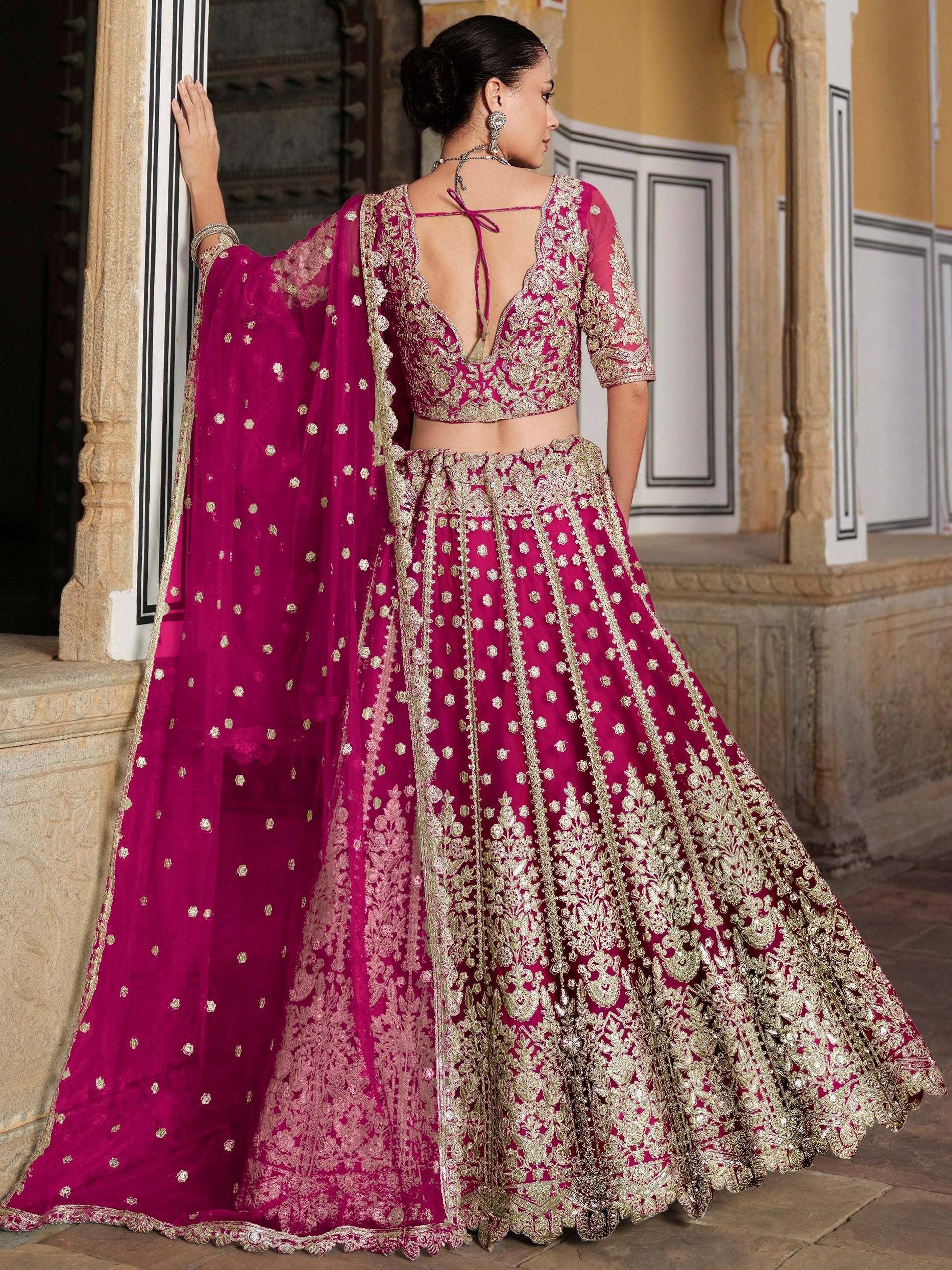 Magenta designer lehenga choli with gold embroidery, back view, ethnic Indian wear