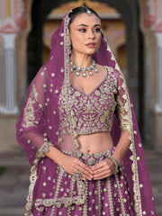 Lovable Purple Embroidered Net Engagement Wear Lehenga Choli