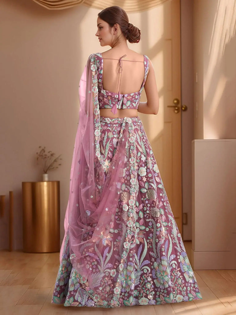 Attractive Pink Sequins Net Bridesmaid Lehenga Choli With Dupatta
