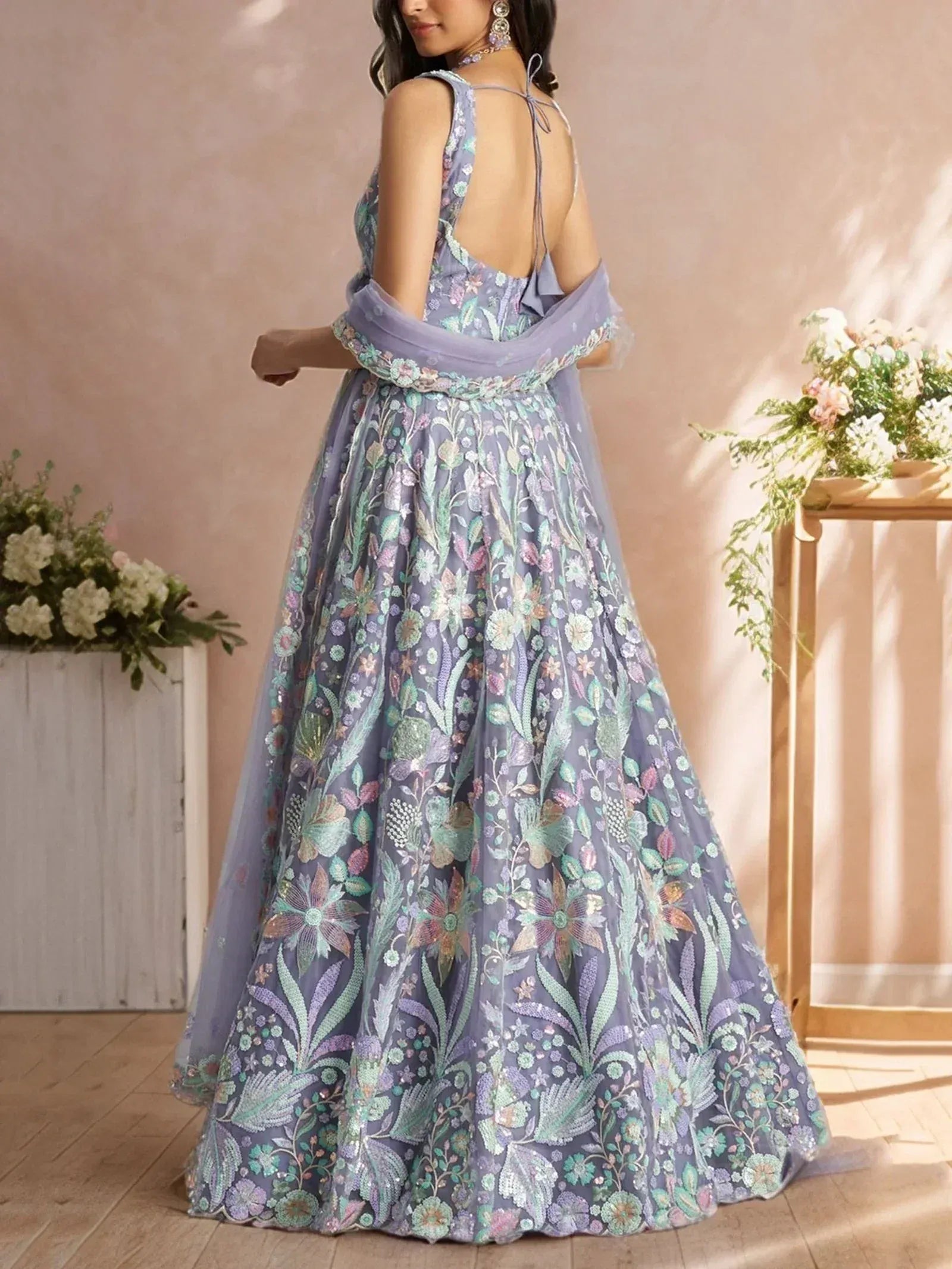 Elegant lavender floral embroidered lehenga choli with open back design