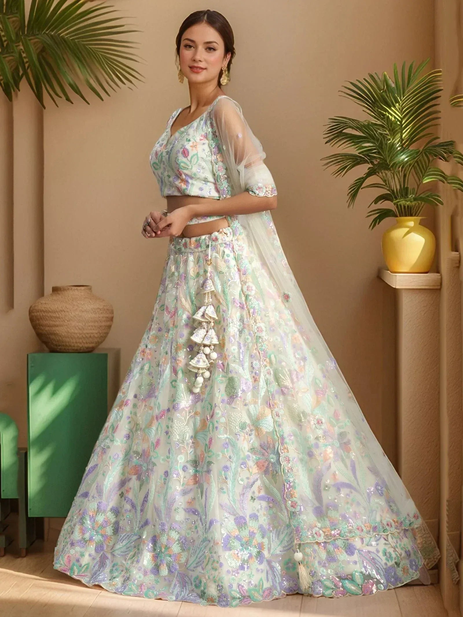 Elegant floral embroidered lehenga choli with sheer dupatta, perfect for Indian weddings and festive occasions