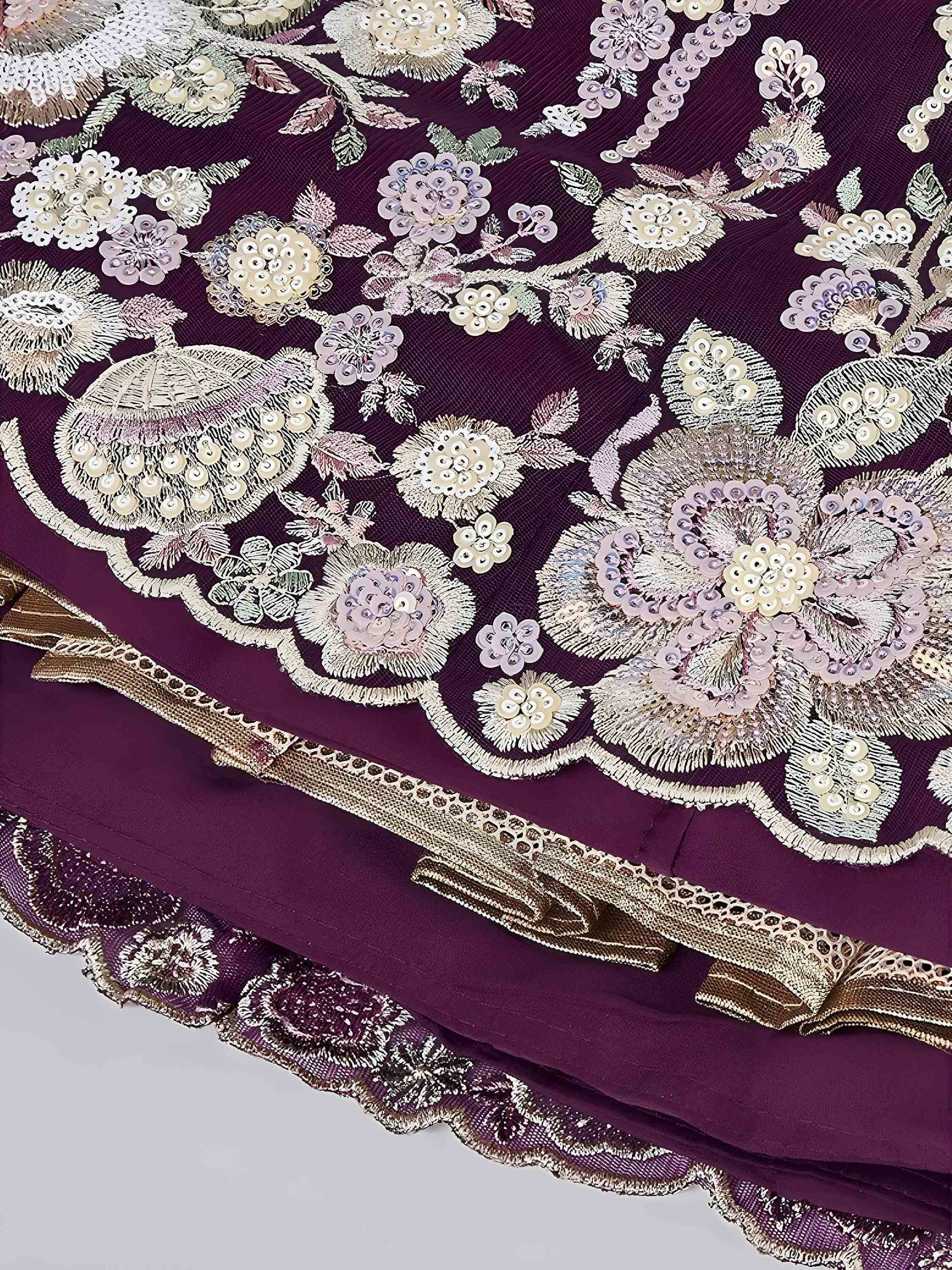 Purple ethnic gown with floral sequin embroidery and gold trim detailing