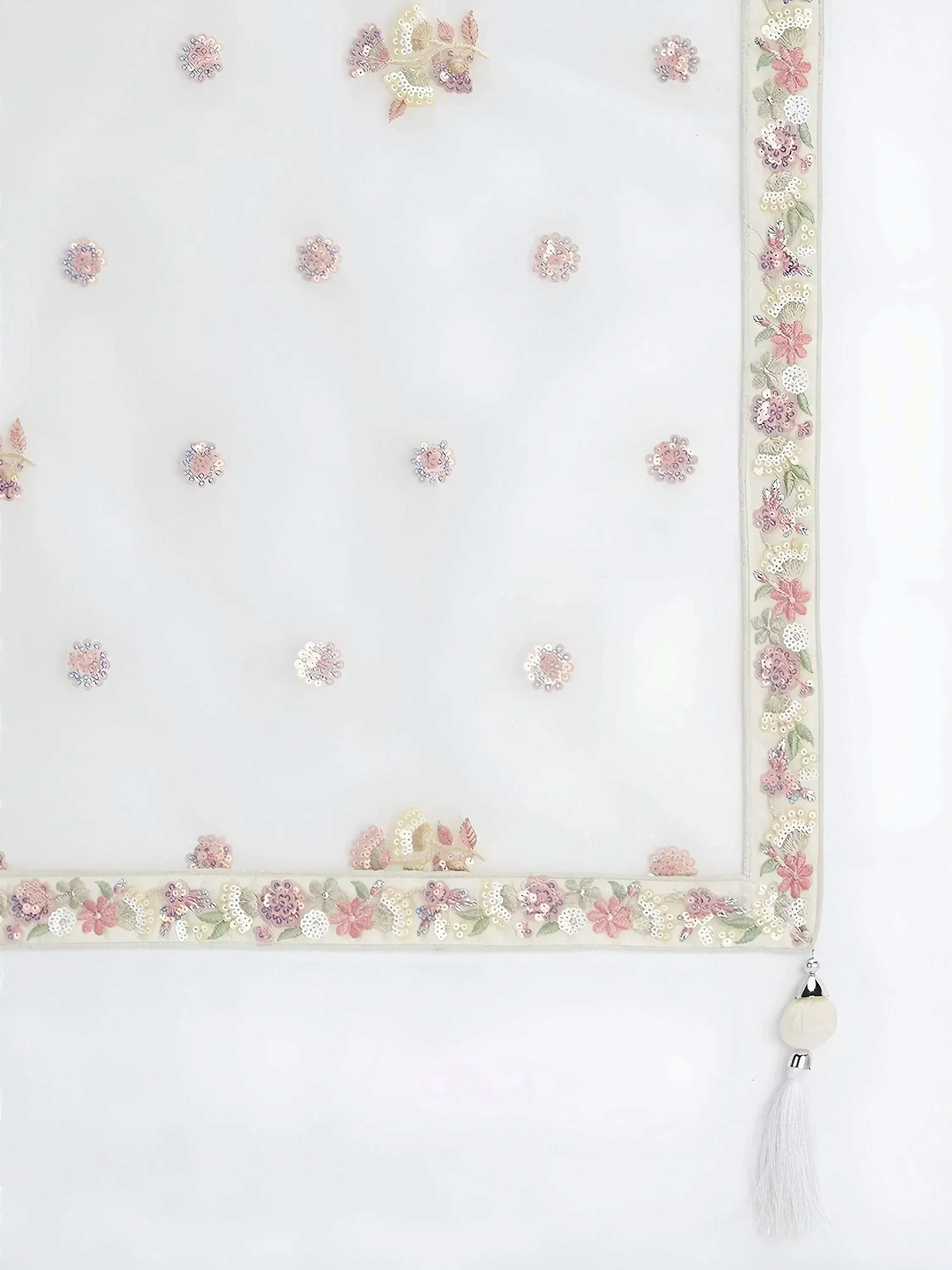 White sheer dupatta with pink floral sequin embroidery and tassel border for ethnic wear