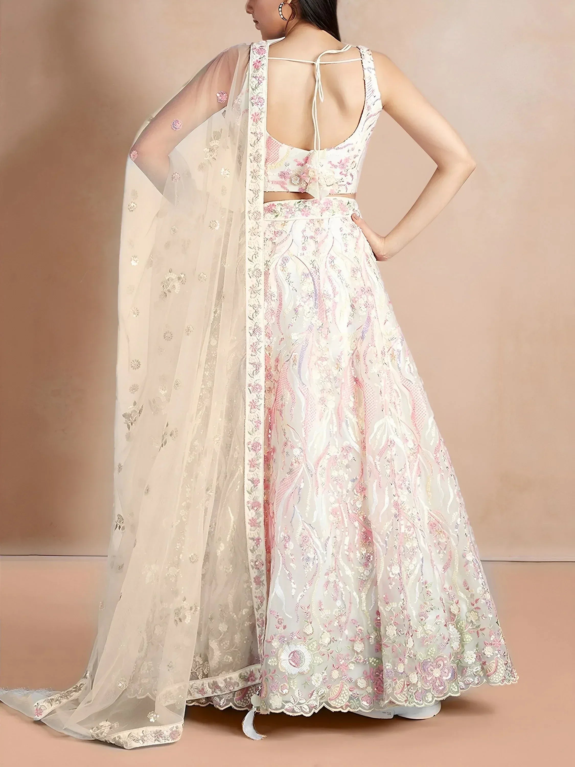 White floral embroidered lehenga choli with sheer dupatta, back view