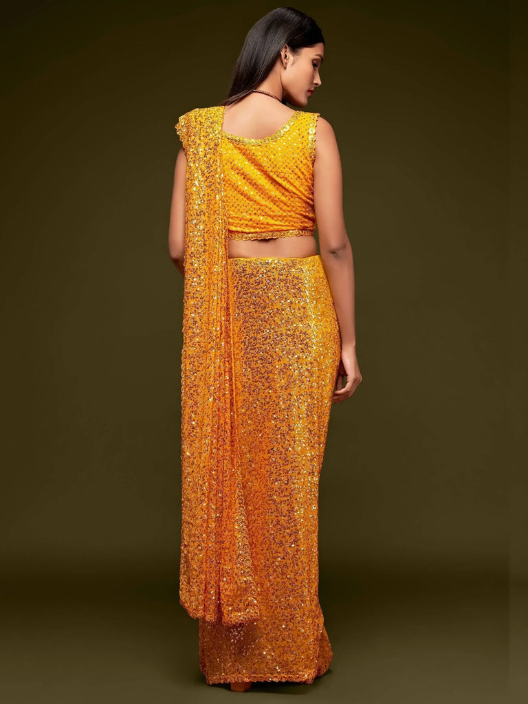 Sabyasachi Yellow Sequins Georgette Party Wear Saree With Blouse