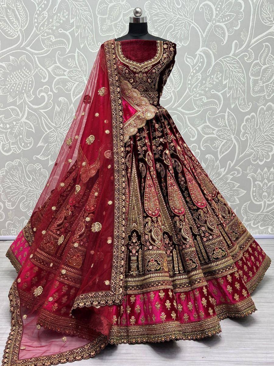 Maroon designer lehenga choli with gold embroidery and sheer dupatta, ethnic Indian wedding wear