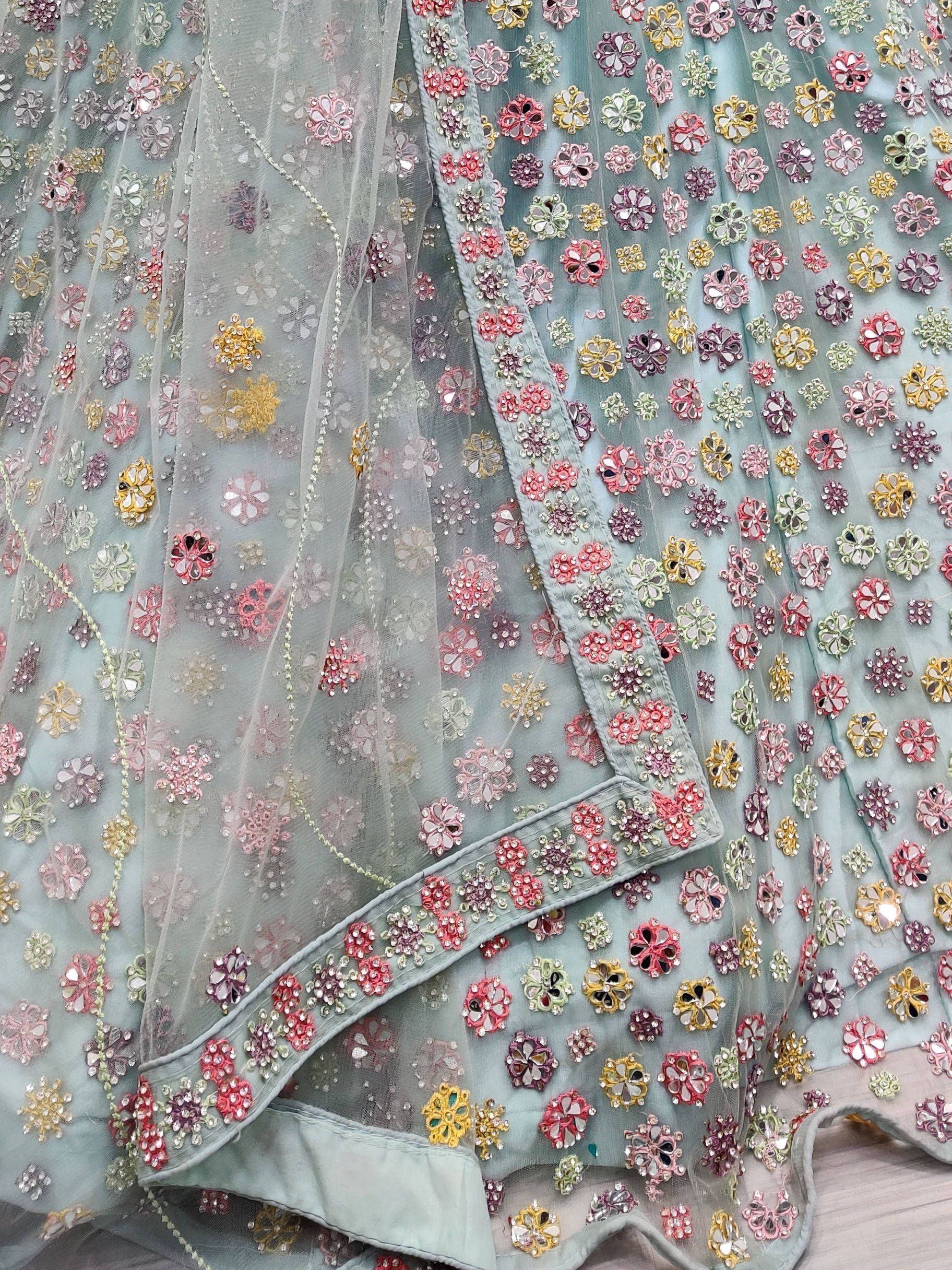 Pastel blue lehenga with floral mirror and sequin embroidery, perfect for Indian ethnic wear occasions