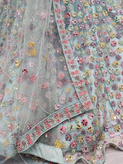 Sumptuous Sky Blue Mirror Work Net Party Wear Lehenga Choli