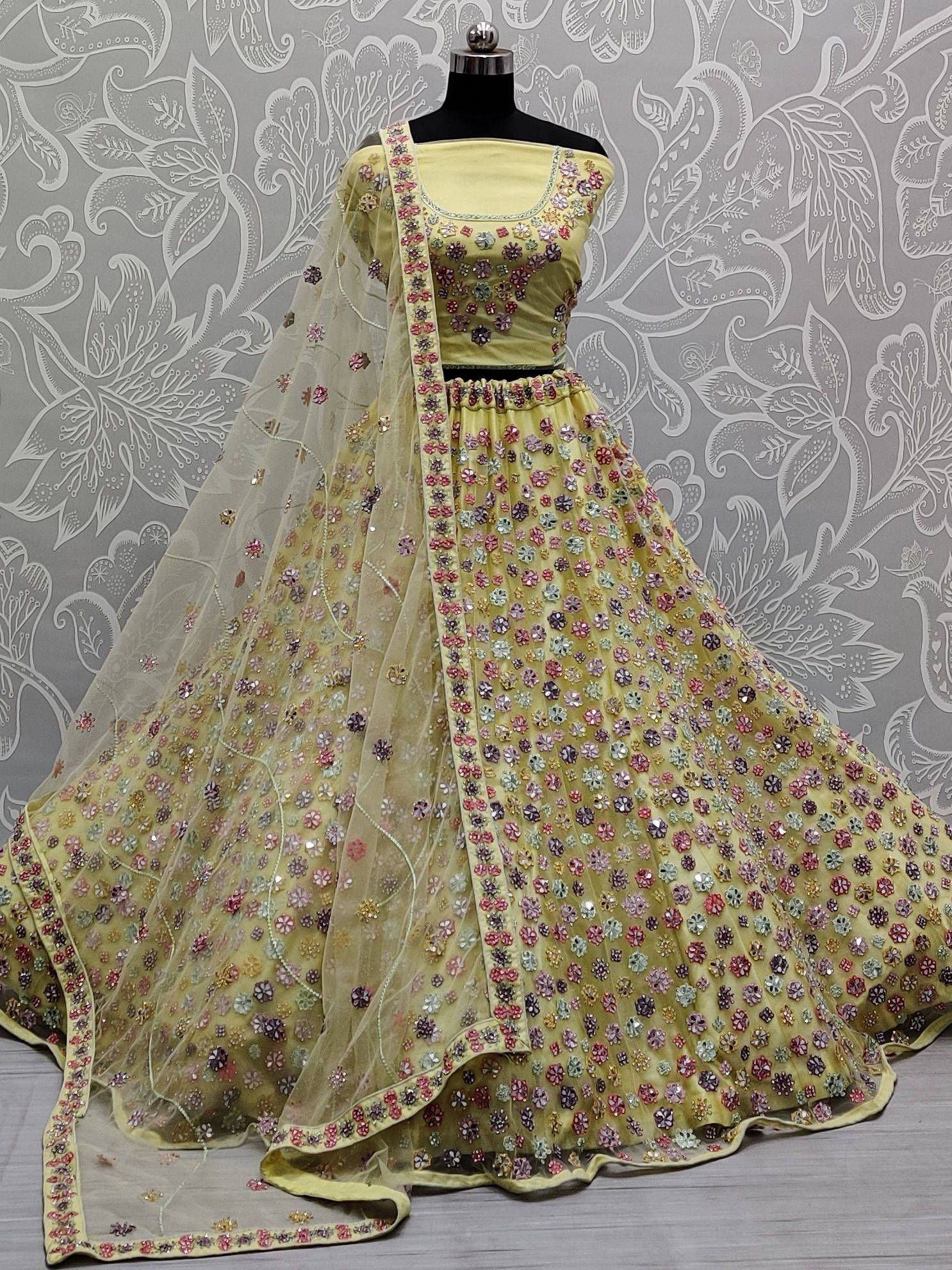 Yellow floral embroidered lehenga choli with net dupatta, Indian ethnic wear for weddings and parties