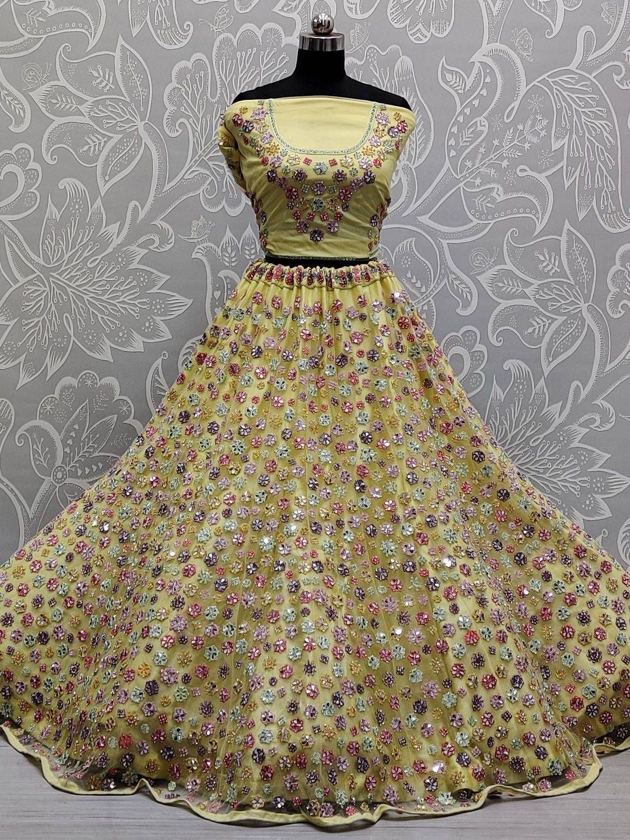Yellow floral embroidered lehenga choli with sequin work, perfect for Indian ethnic occasions