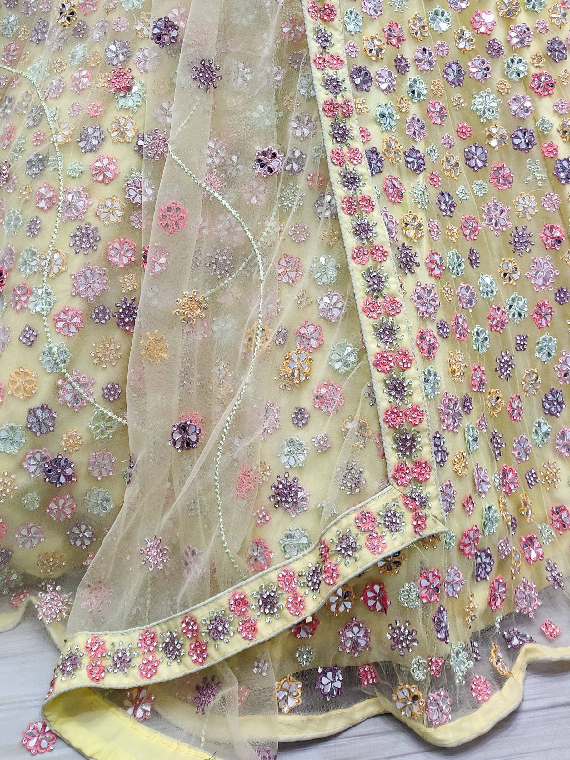 Pastel yellow ethnic gown with floral mirror and sequin embroidery, sheer overlay, designer Indian wear