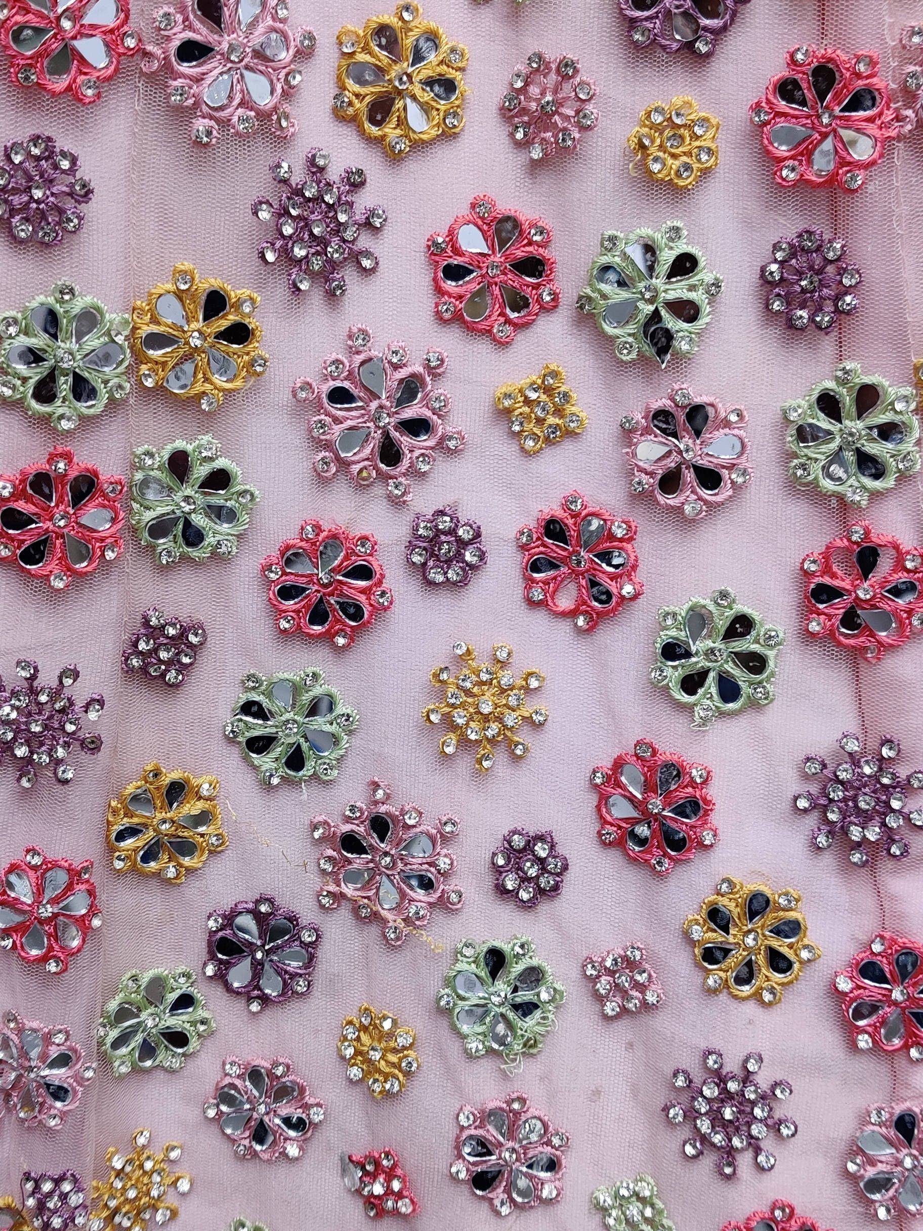 Colorful floral mirror and bead embroidery on pink net fabric for ethnic wear