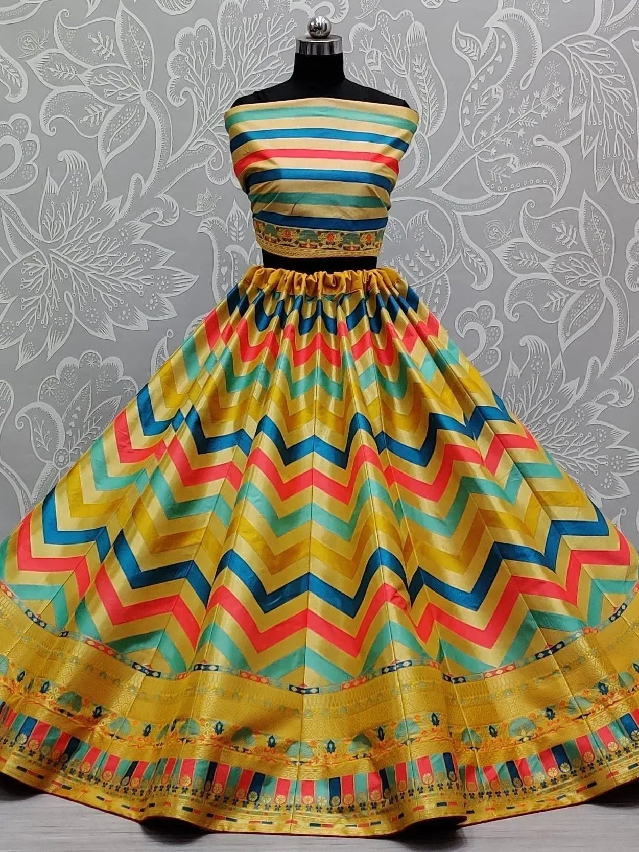Colorful ethnic lehenga choli with zigzag pattern, perfect for Indian festivals and weddings