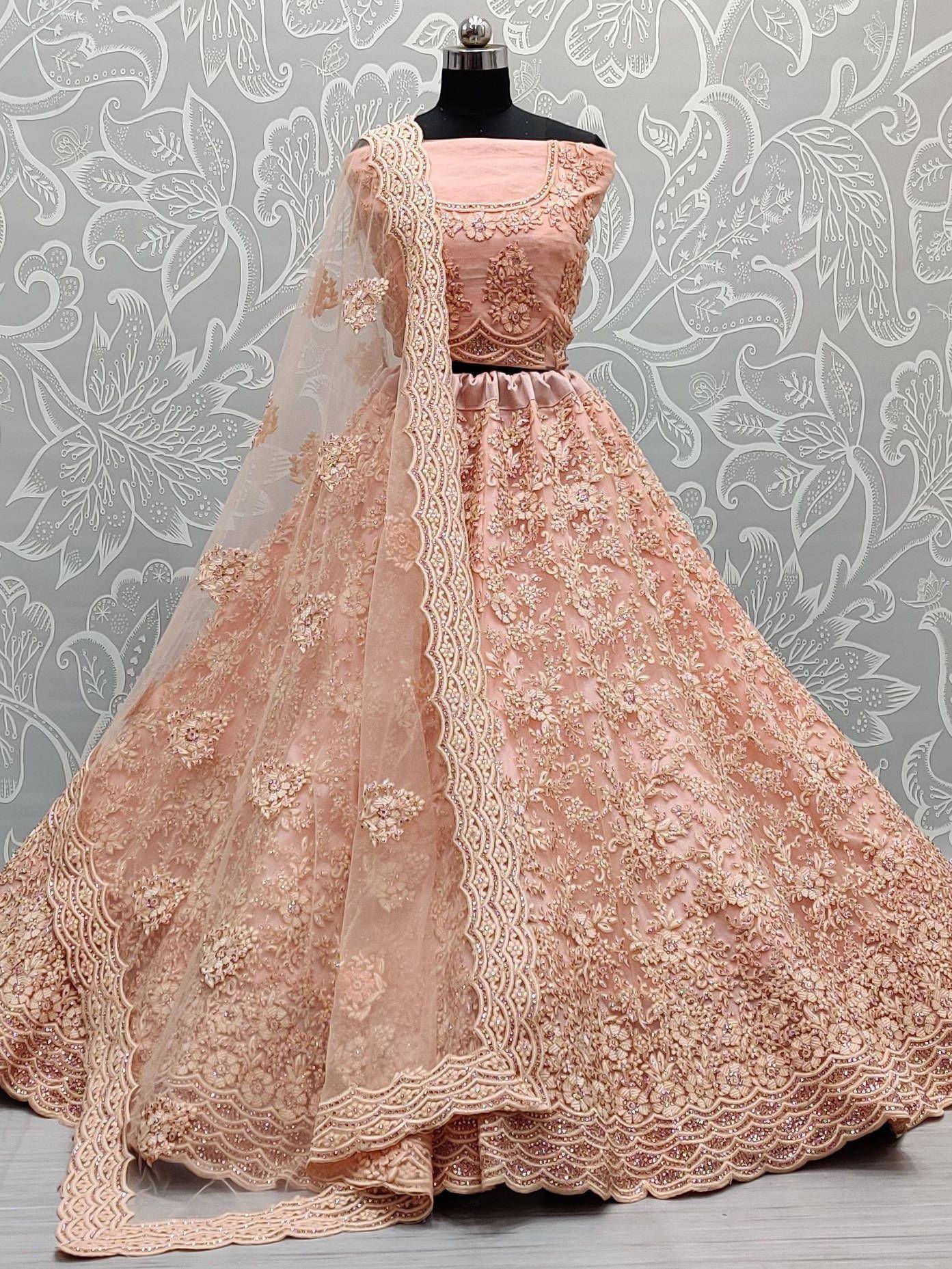 Pink embroidered lehenga choli with net dupatta, designer Indian ethnic wear for weddings