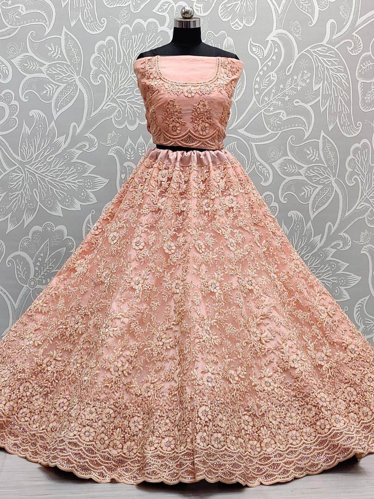 Ravishing Peach Cording Work Net Wedding Wear Lehenga Choli