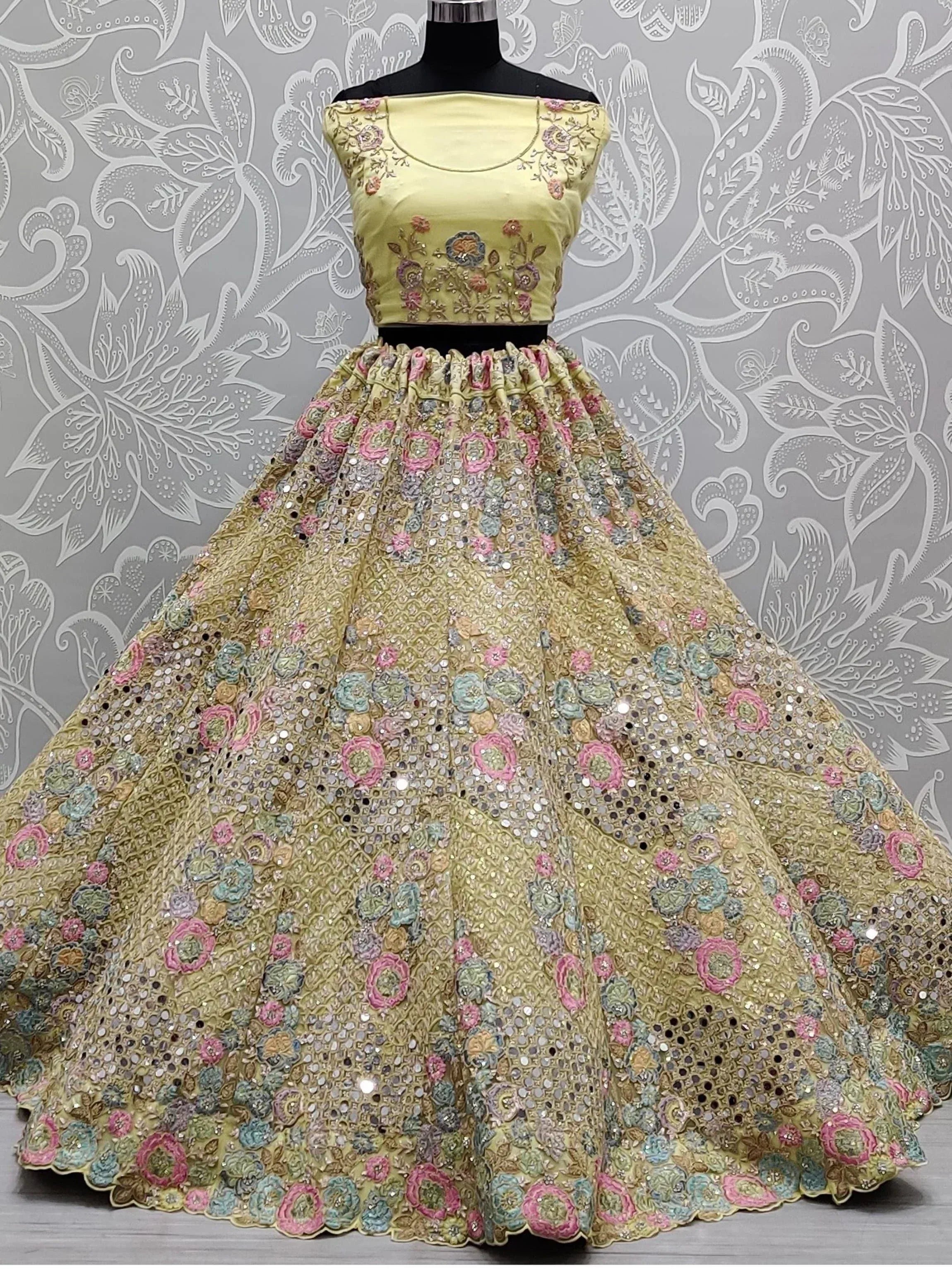 Yellow floral embroidered lehenga choli with sequins, perfect for Indian ethnic wear occasions