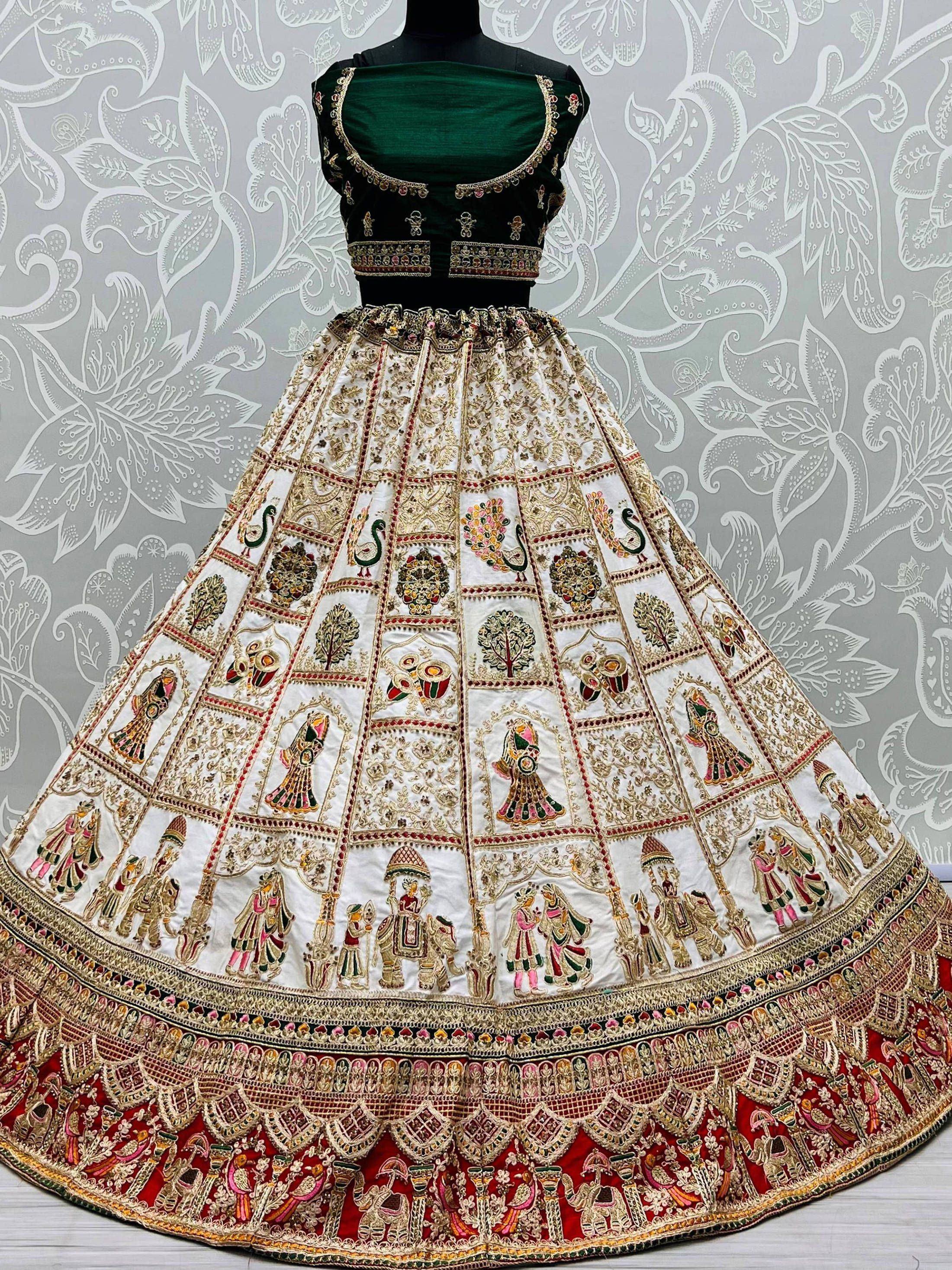 Green blouse with white and red embroidered lehenga featuring peacock and royal motifs, ideal for Indian ethnic occasions.