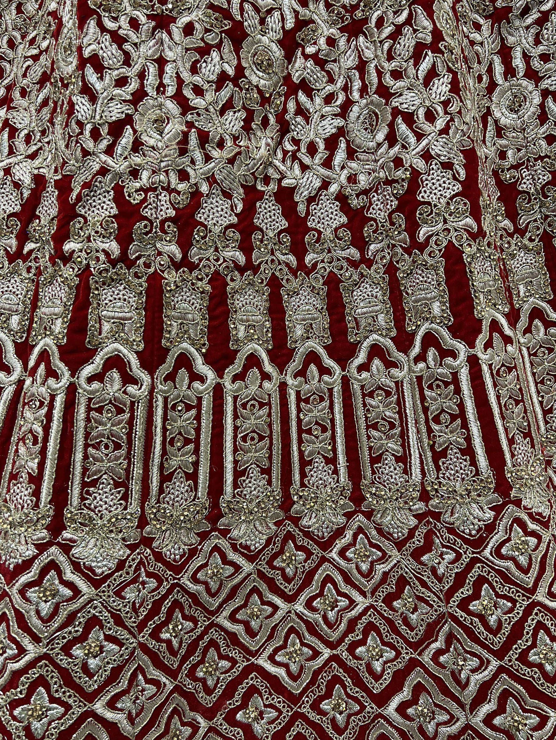 Rich red velvet with intricate silver floral embroidery and beadwork for ethnic wear