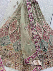 Outstanding Green Patch Work Net Bridal Wear Lehenga Choli