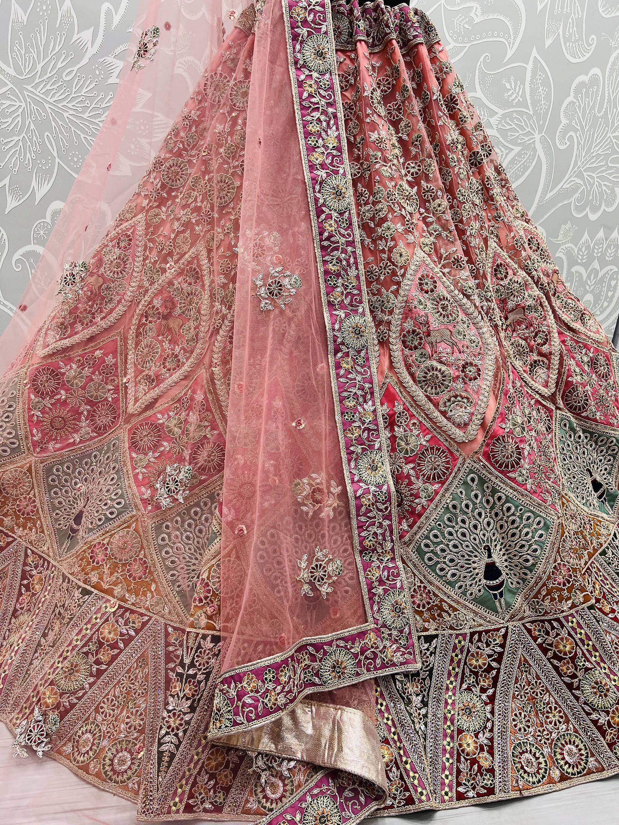 Pink embroidered lehenga choli with floral motifs and sheer dupatta, Indian ethnic wear