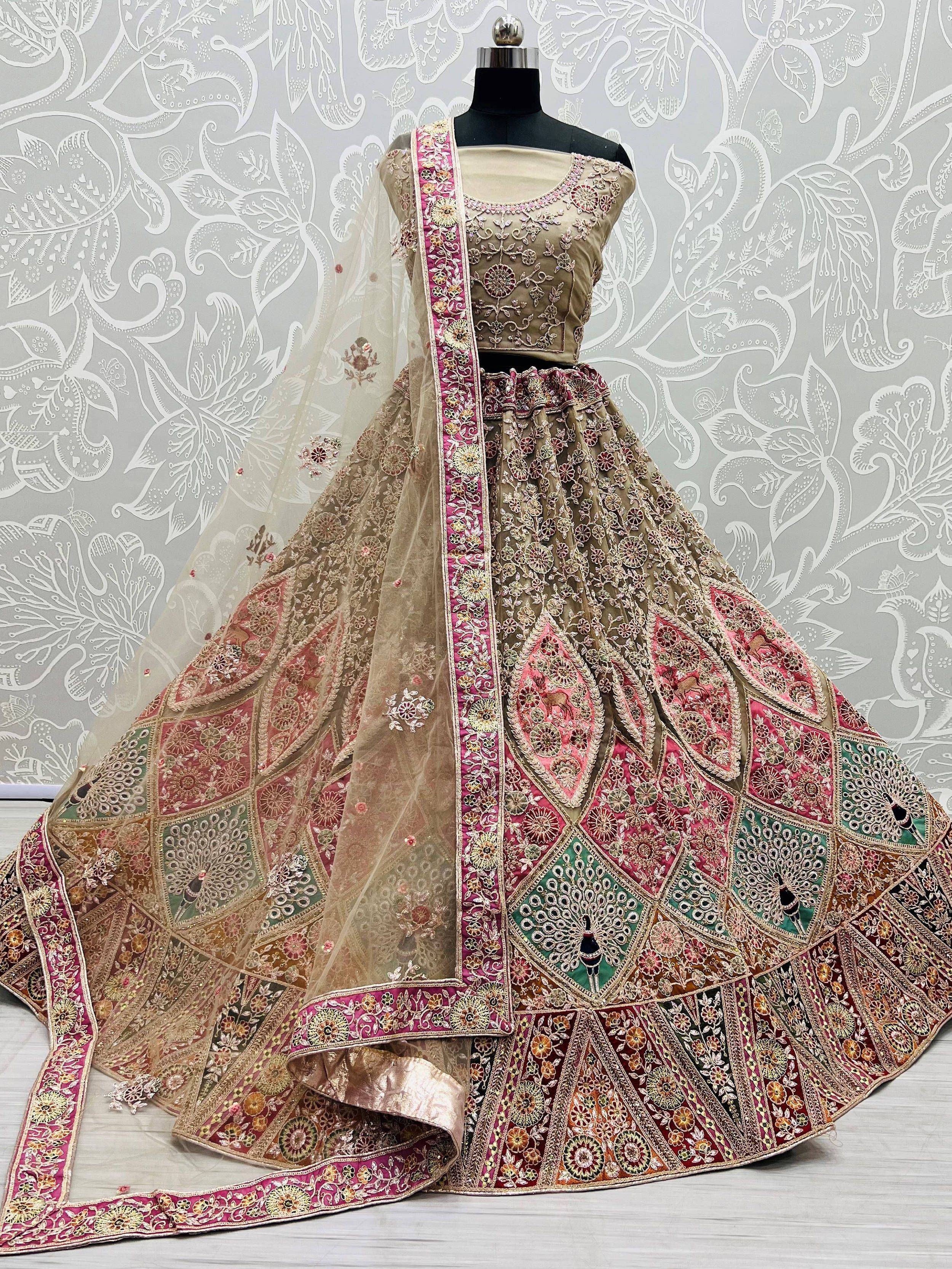 Designer lehenga choli with intricate floral embroidery, perfect for Indian weddings and festive occasions.
