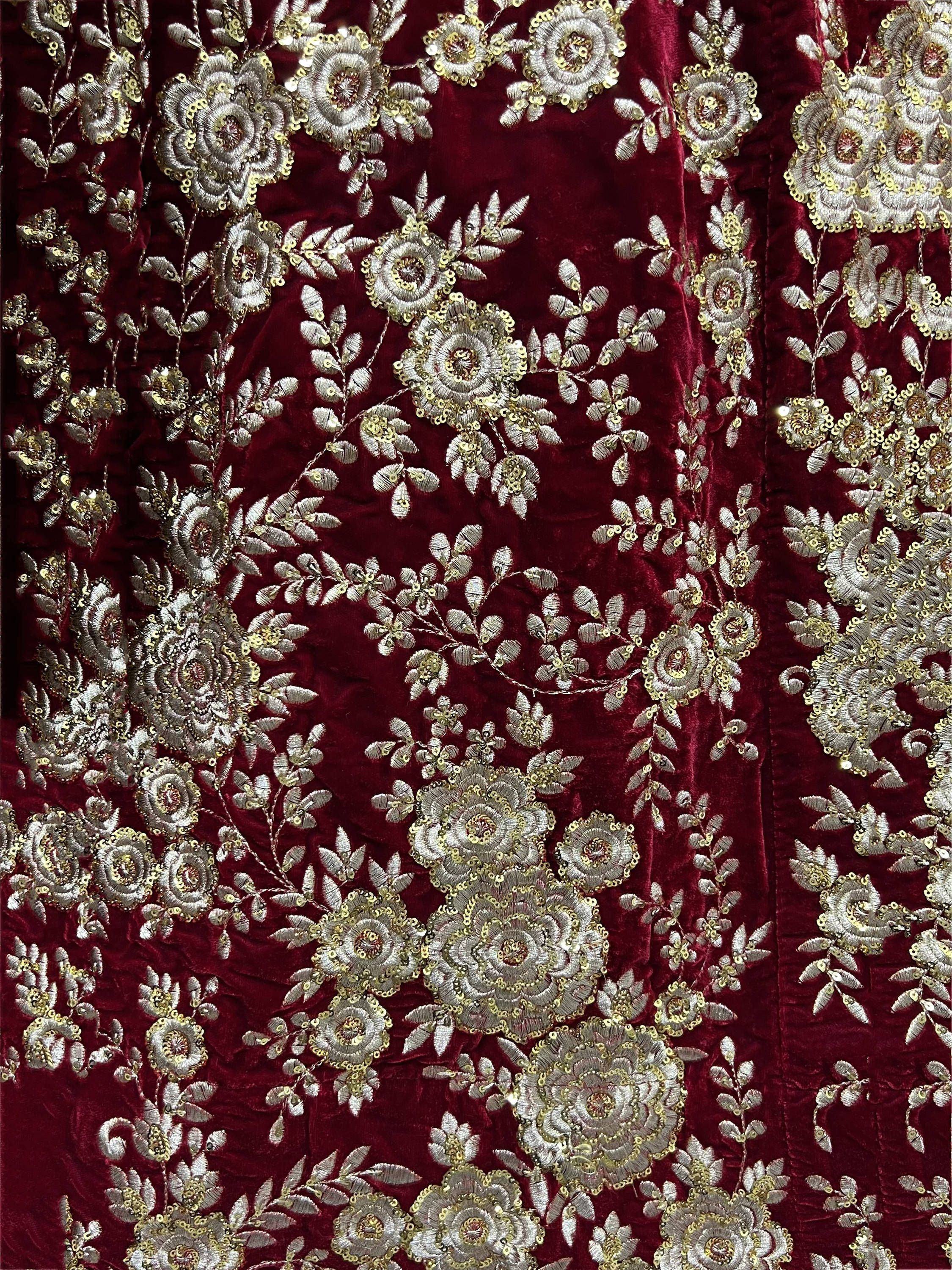 Rich maroon velvet with intricate silver and gold floral embroidery for ethnic wear