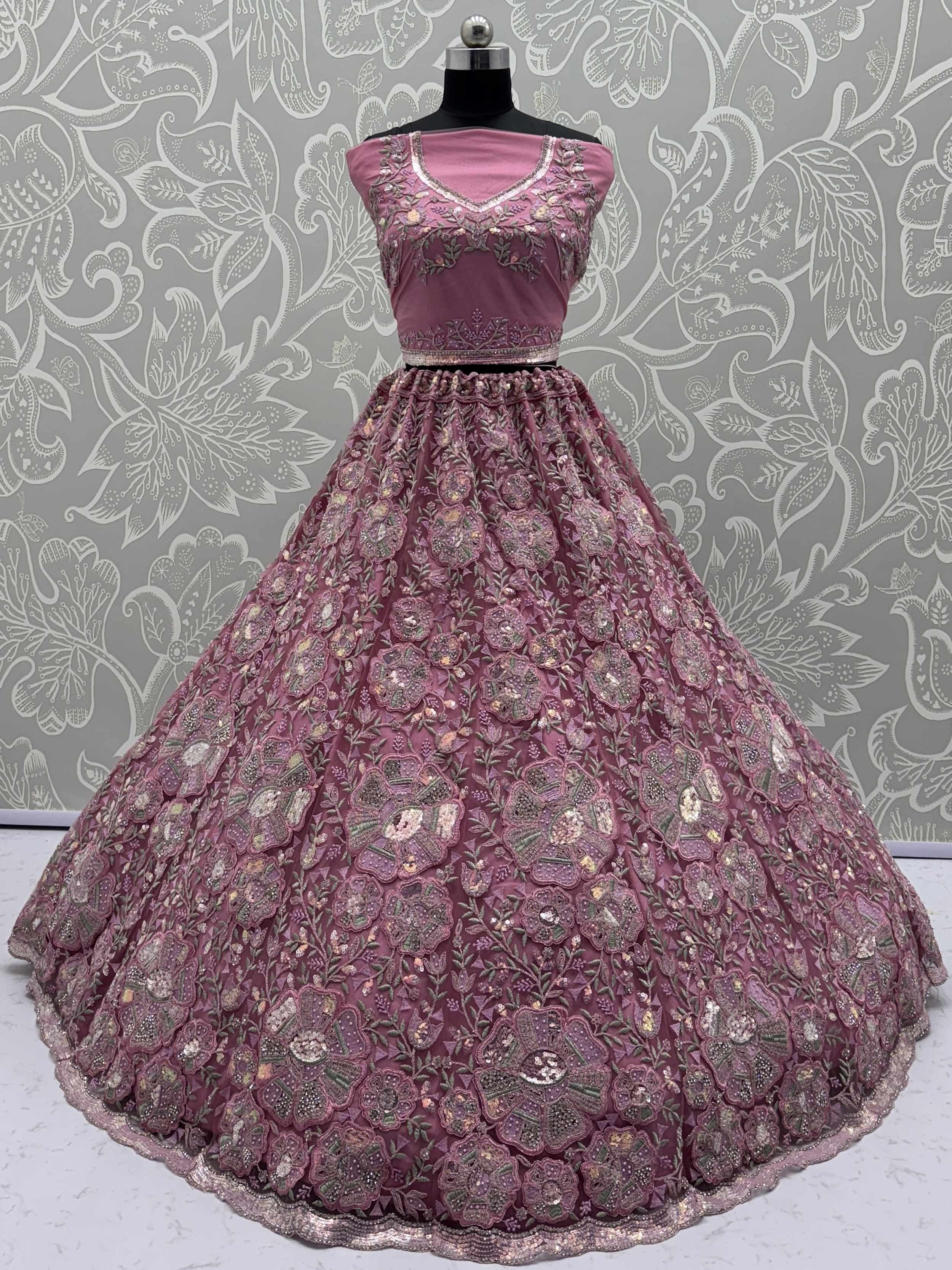 Glamorous Pink Net Sequins Wedding Wear Lehenga Choli With Dupatta