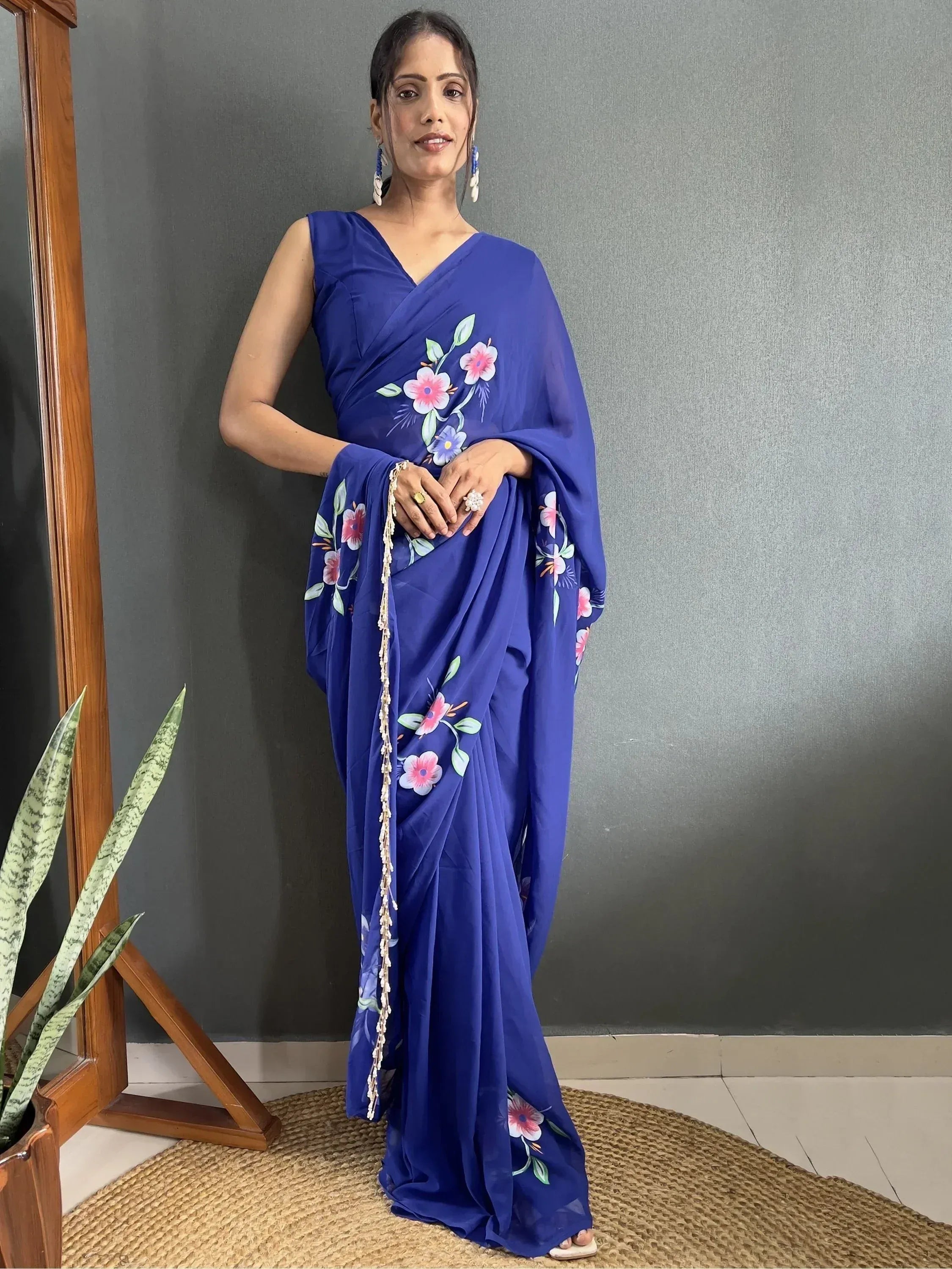 Royal blue floral print saree with V-neck blouse, perfect for Indian ethnic wear occasions