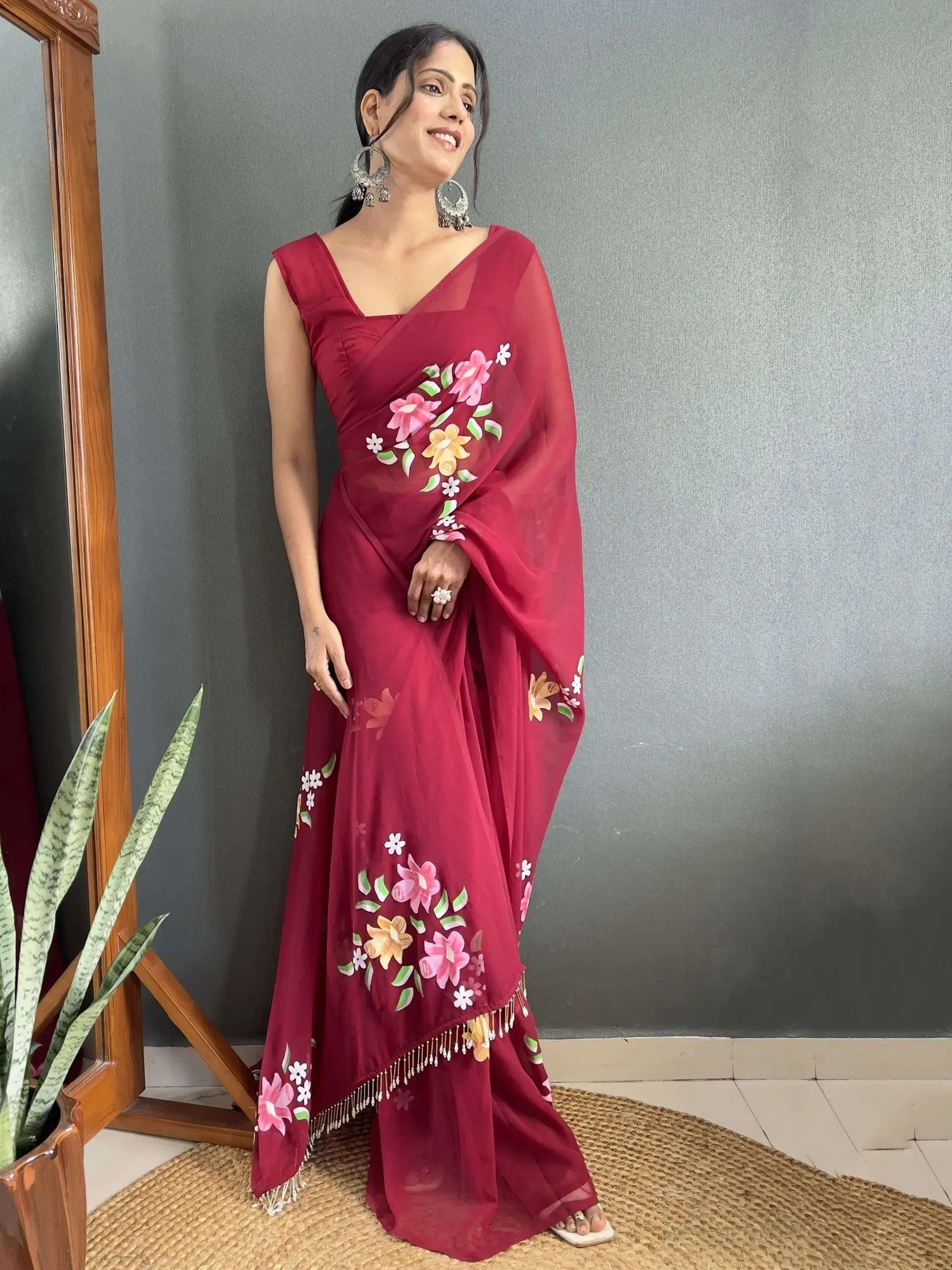Maroon floral embroidered saree with tassels, Indian ethnic wear for women