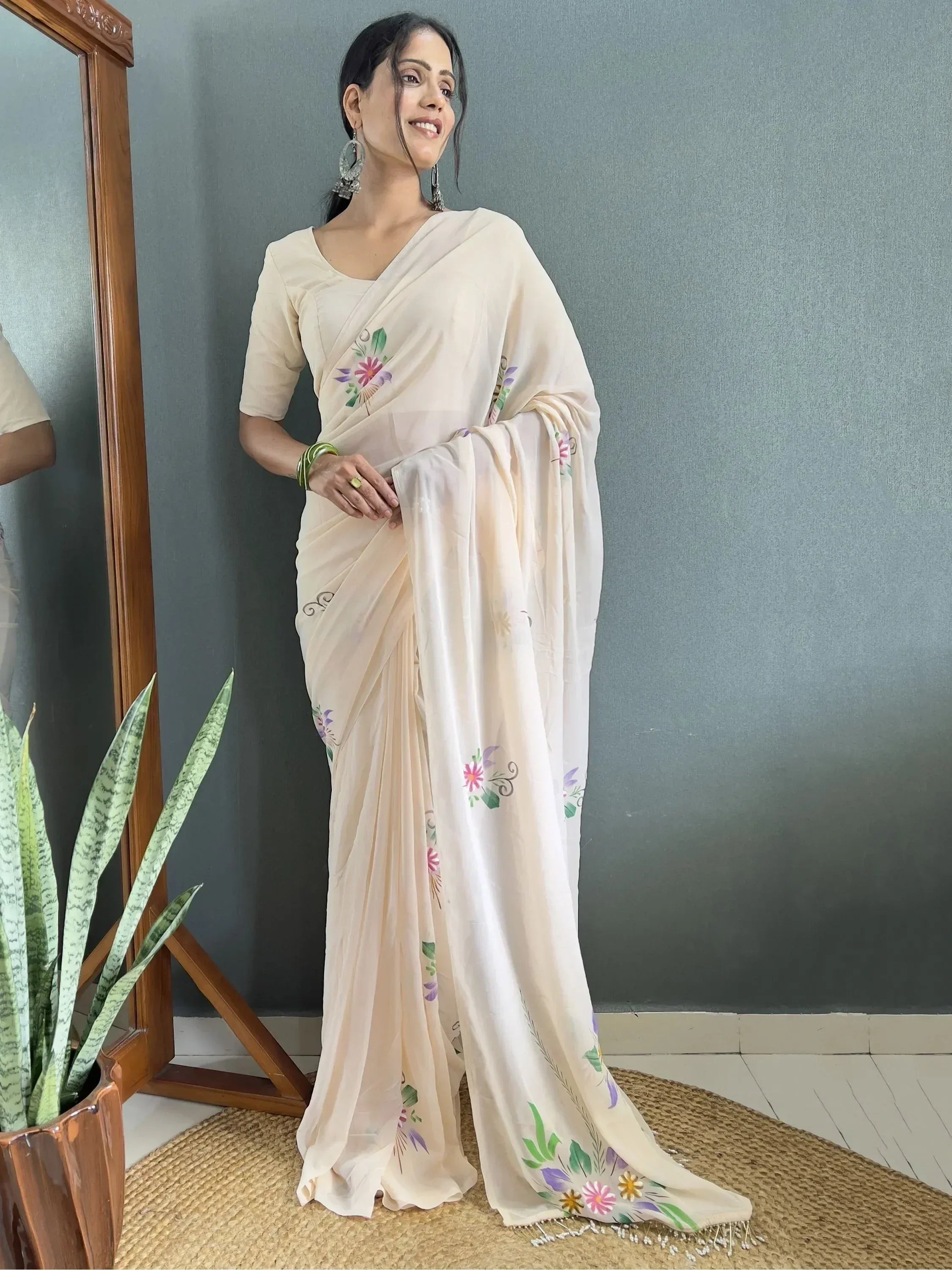 Cream floral printed saree with embroidered details, perfect for Indian ethnic wear occasions